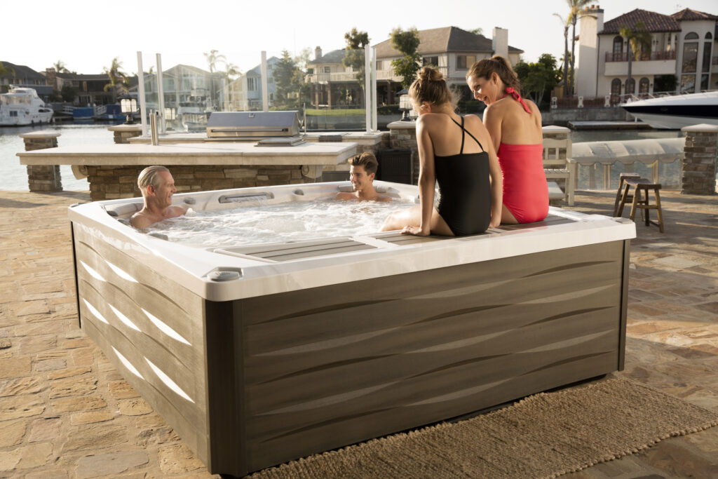 family enjoying in hot tub