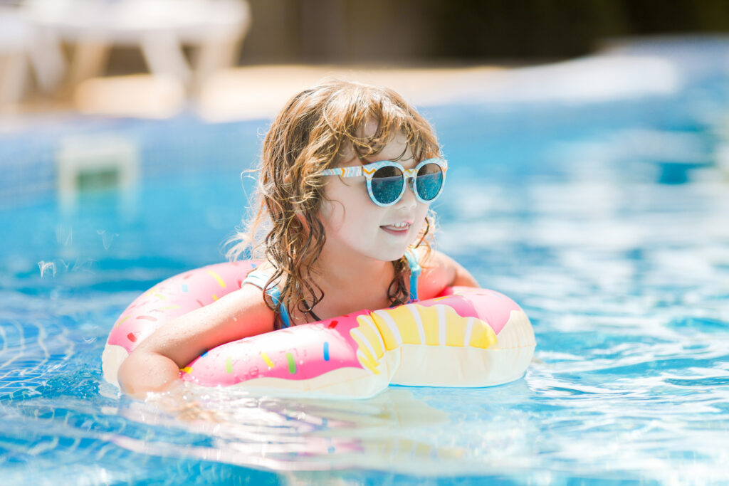 child in swimming pool
