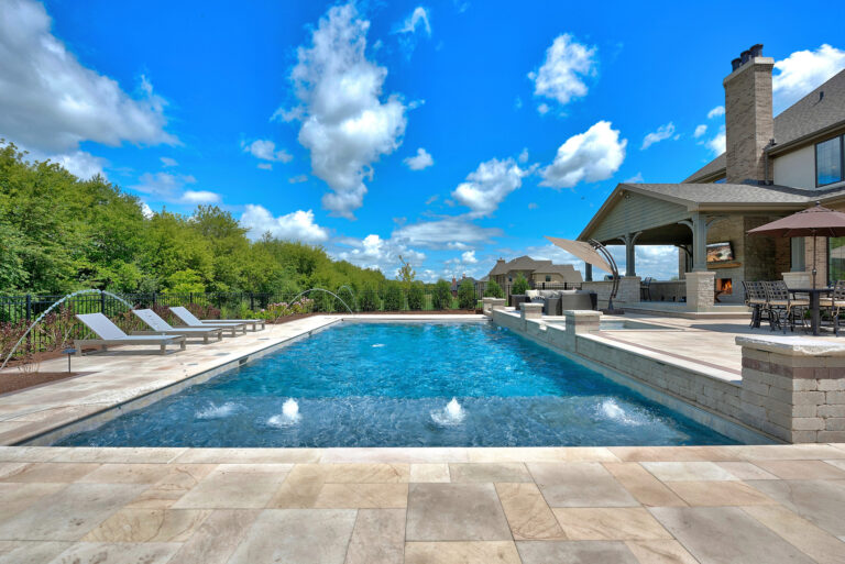 Big swimming pool with lounge chairs